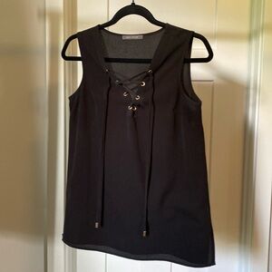 Small. Light weight dress shirt with ties bc